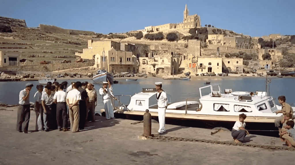A Royal Navy tender docked in Mgarr Harbour.