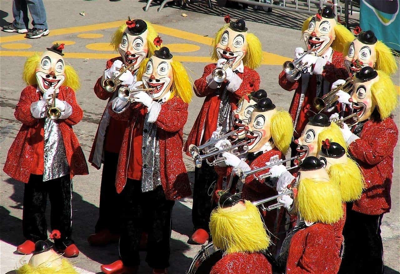 A group of carnival revellers dressed as clowns.