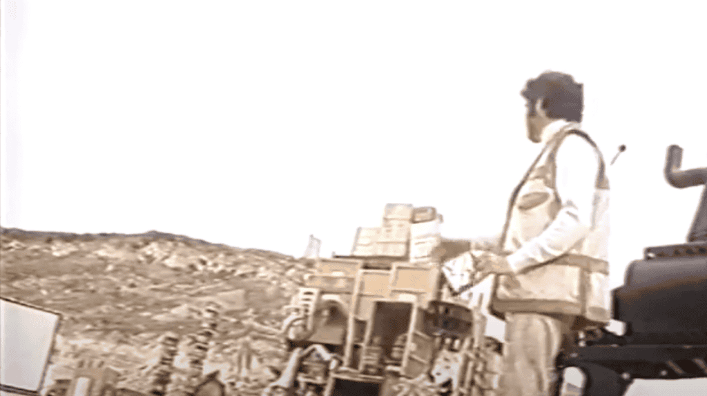 A fantastical set on Ramla Beach, a tall pile of random objects.