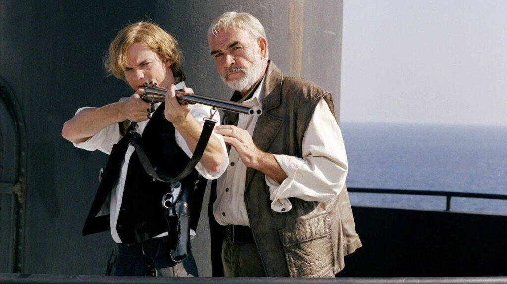 Alan Quatermain (Sean Connery) teaches Tom Sawyer (Shane West) to shot on the conning tower of the Nautilus.