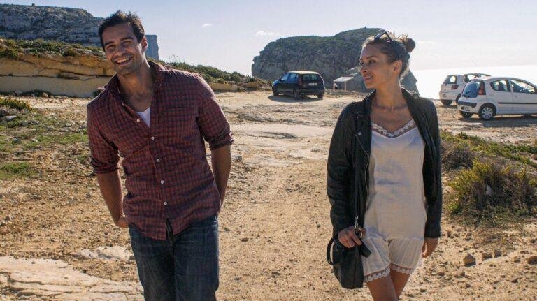 Vincent, Greg Audino, and Ariadna Cabrol, Annalisa, walk through the car part at DWerja Bay.