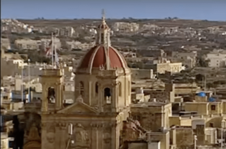 Rooftop view of Victoria, with St George's Basilica. in the centre.
