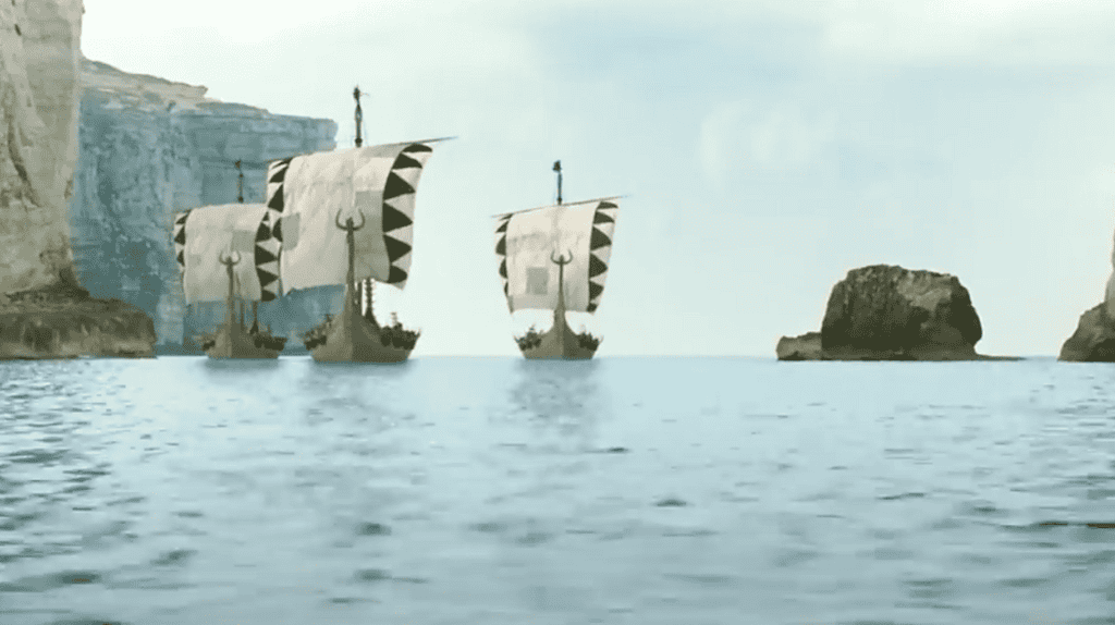 Two Viking ships sail into Dwerja Bay.