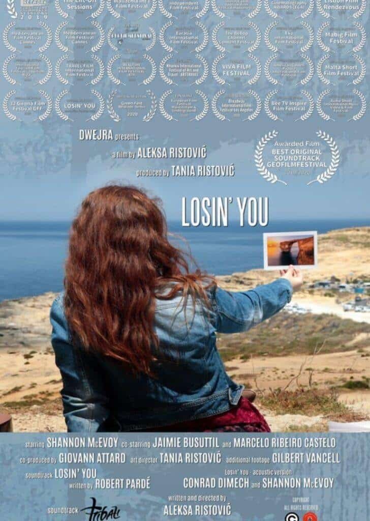 Losin' You film poster with woman holding photo of sunset over landscape at Gozo island.