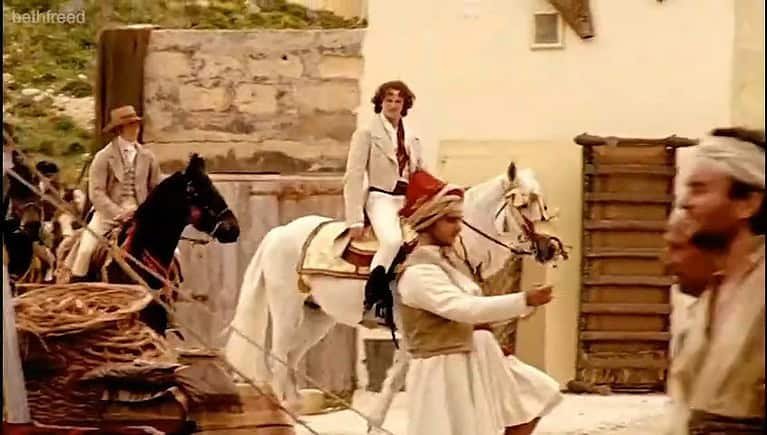 Historical scene with horses and riders.