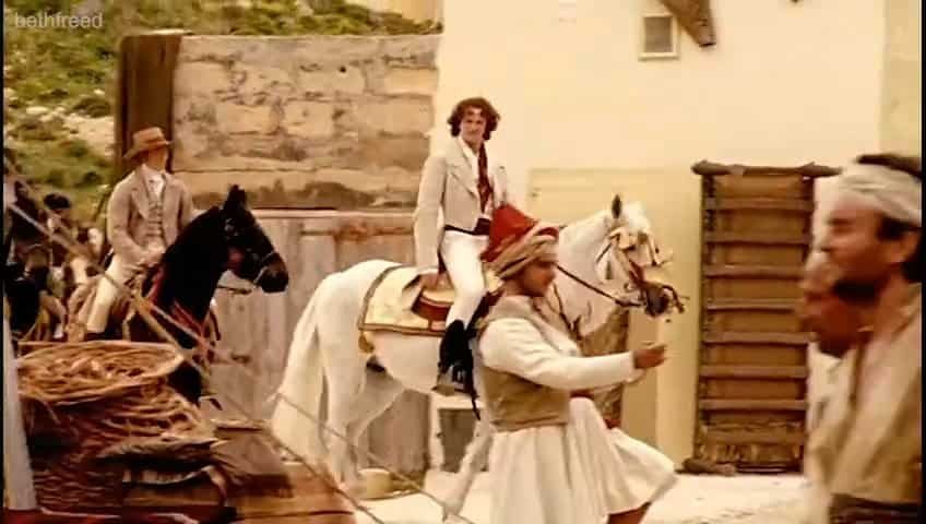 Historical scene with horses and riders.