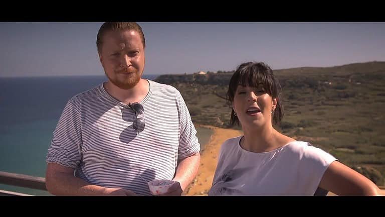 Simon and Anna enjoy an ice-cream at the Calypso Cave viewing point.