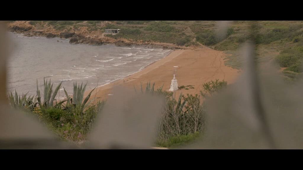 View of Ramla Bay from inside a broken window.