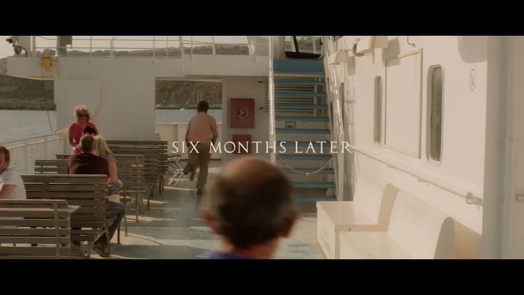 Ferry passengers waiting, time passage indicated.