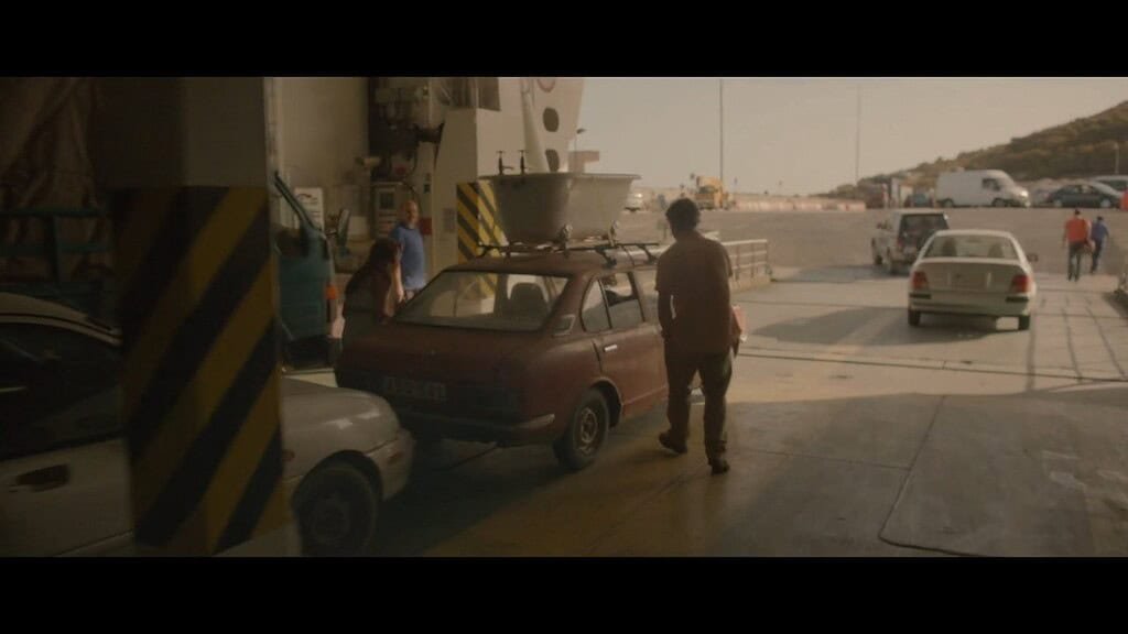 Cars ready to drive off a ferry.