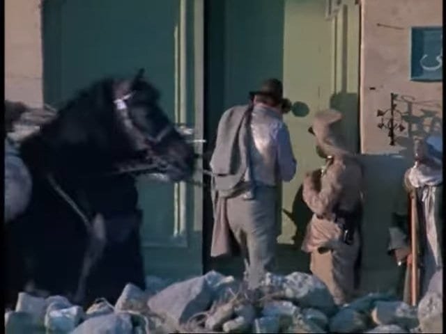 Fragmented street scene with people and animals in a historical setting, capturing local culture and daily life.