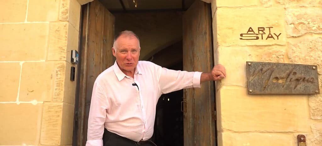 Dan stands in the doorway of Art Stay Modique B&B, Gozo.