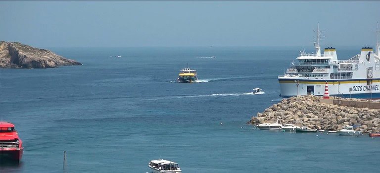 Ferries navigating calm blue waters.