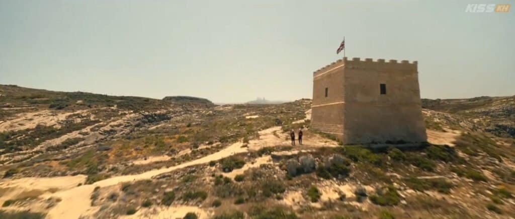 Historic watchtower on Gozo island with clear sky background.