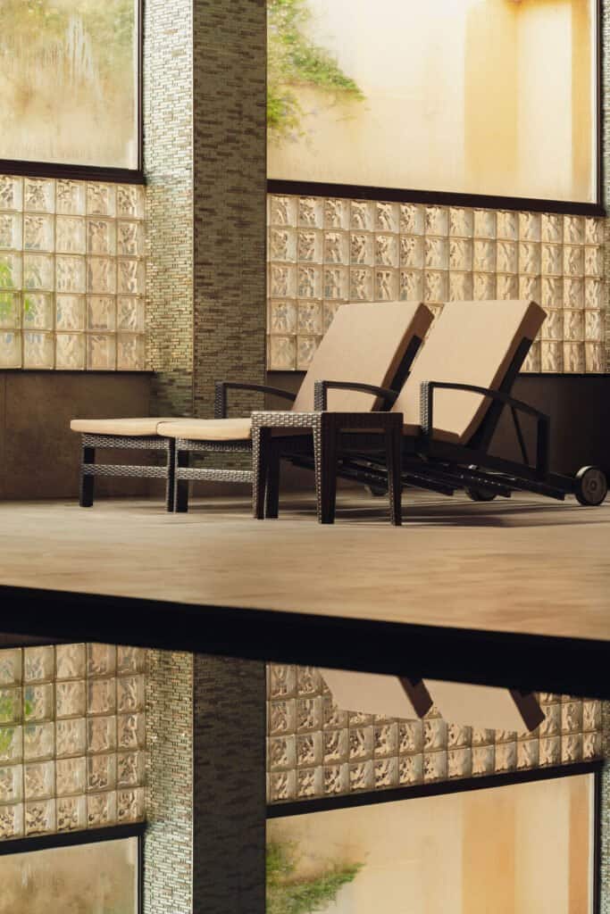Loungers beside the indoor pool at the Grand Hotel's ELEMIS Spa, Għajnsielem, Gozo