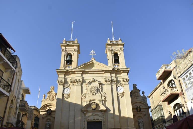 Historic church against clear blue sky