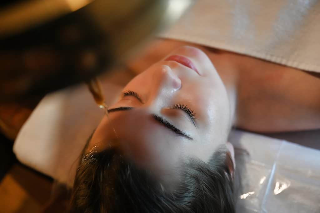 A guest relaxing during an Ayurveda treatment at Kempinski Hotel San Lawrenz, Gozo